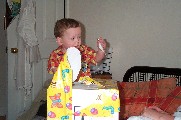 Oli tearing at the wrapping paper - 8th May