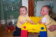 Oliver and Ellie playing with activity table - 8th May