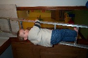 Oli climbing the loft ladder