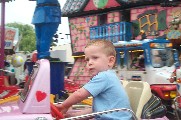 Oli in car on carousel